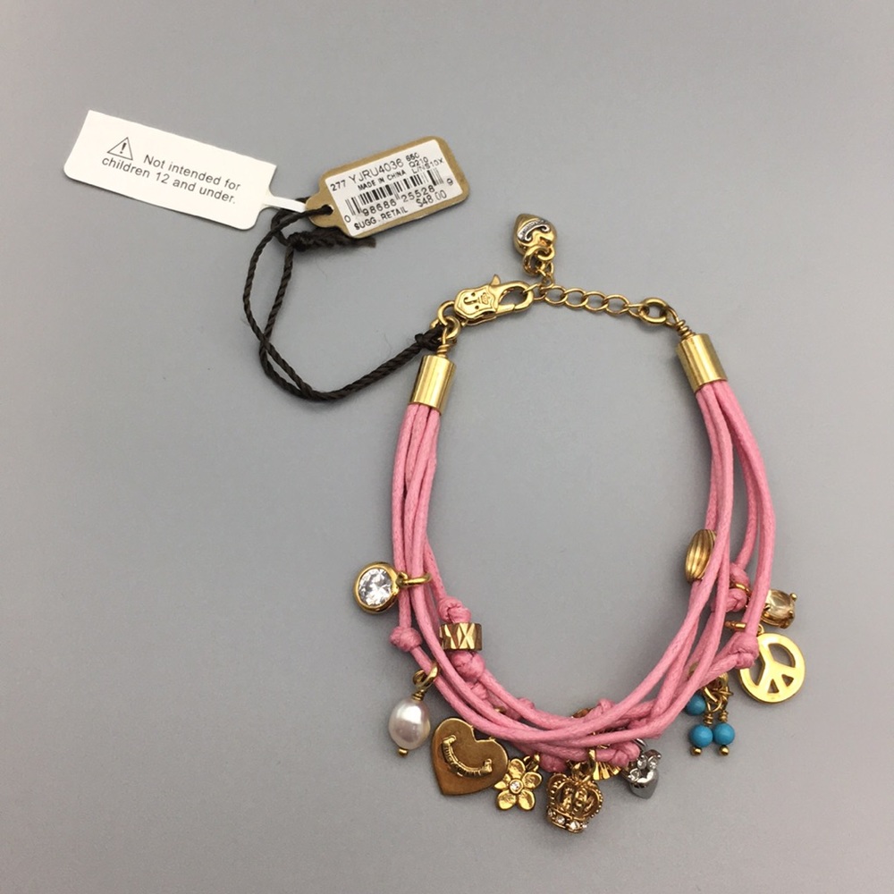 Juicy Couture pink bracelet with charms. NWT